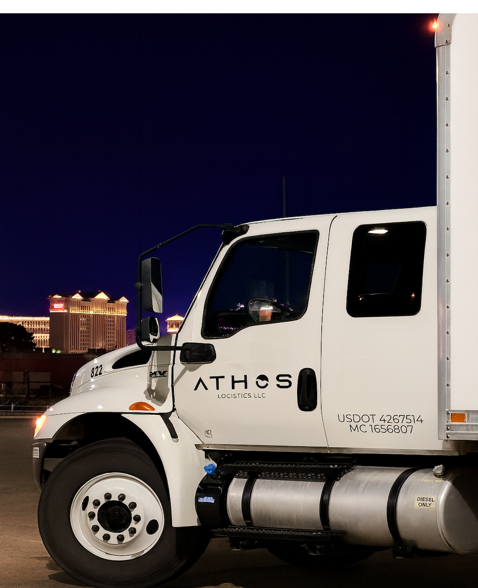 ATHOS rental truck #822 at night with city lights